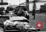 Image of US soldiers visit an open air market Archangel Russia, 1918, second 43 stock footage video 65675053036