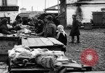 Image of US soldiers visit an open air market Archangel Russia, 1918, second 44 stock footage video 65675053036