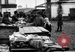 Image of US soldiers visit an open air market Archangel Russia, 1918, second 46 stock footage video 65675053036