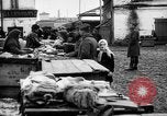 Image of US soldiers visit an open air market Archangel Russia, 1918, second 47 stock footage video 65675053036