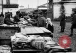 Image of US soldiers visit an open air market Archangel Russia, 1918, second 48 stock footage video 65675053036