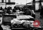 Image of US soldiers visit an open air market Archangel Russia, 1918, second 50 stock footage video 65675053036