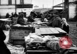 Image of US soldiers visit an open air market Archangel Russia, 1918, second 51 stock footage video 65675053036