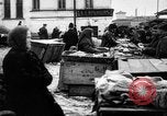 Image of US soldiers visit an open air market Archangel Russia, 1918, second 54 stock footage video 65675053036