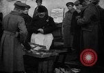 Image of US soldiers visit an open air market Archangel Russia, 1918, second 61 stock footage video 65675053036