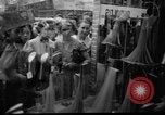 Image of women buying silk stockings during war ration United States USA, 1942, second 3 stock footage video 65675053064