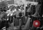 Image of women buying silk stockings during war ration United States USA, 1942, second 6 stock footage video 65675053064