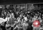 Image of women buying silk stockings during war ration United States USA, 1942, second 11 stock footage video 65675053064