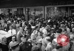 Image of women buying silk stockings during war ration United States USA, 1942, second 12 stock footage video 65675053064