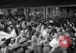 Image of women buying silk stockings during war ration United States USA, 1942, second 14 stock footage video 65675053064