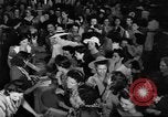 Image of women buying silk stockings during war ration United States USA, 1942, second 19 stock footage video 65675053064