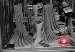 Image of women buying silk stockings during war ration United States USA, 1942, second 23 stock footage video 65675053064
