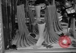 Image of women buying silk stockings during war ration United States USA, 1942, second 24 stock footage video 65675053064