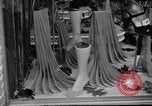 Image of women buying silk stockings during war ration United States USA, 1942, second 25 stock footage video 65675053064
