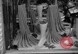 Image of women buying silk stockings during war ration United States USA, 1942, second 26 stock footage video 65675053064