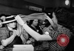 Image of women buying silk stockings during war ration United States USA, 1942, second 29 stock footage video 65675053064
