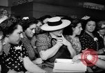Image of women buying silk stockings during war ration United States USA, 1942, second 33 stock footage video 65675053064