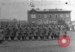 Image of military parade in town Russia, 1916, second 1 stock footage video 65675053078