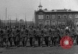 Image of military parade in town Russia, 1916, second 4 stock footage video 65675053078