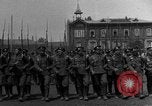 Image of military parade in town Russia, 1916, second 6 stock footage video 65675053078