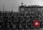 Image of military parade in town Russia, 1916, second 7 stock footage video 65675053078