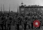 Image of military parade in town Russia, 1916, second 8 stock footage video 65675053078