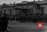 Image of military parade in town Russia, 1916, second 21 stock footage video 65675053078