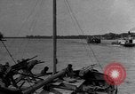 Image of boats on river Russia, 1916, second 7 stock footage video 65675053081