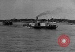 Image of boats on river Russia, 1916, second 18 stock footage video 65675053081