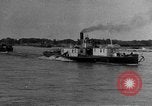 Image of boats on river Russia, 1916, second 23 stock footage video 65675053081