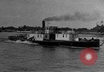 Image of boats on river Russia, 1916, second 27 stock footage video 65675053081
