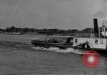 Image of boats on river Russia, 1916, second 33 stock footage video 65675053081