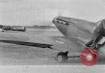 Image of Spitfire airplanes readied for combat United Kingdom, 1940, second 1 stock footage video 65675053155