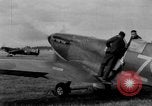 Image of Spitfire airplanes readied for combat United Kingdom, 1940, second 4 stock footage video 65675053155