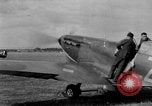 Image of Spitfire airplanes readied for combat United Kingdom, 1940, second 5 stock footage video 65675053155