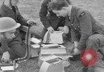 Image of Spitfire airplanes readied for combat United Kingdom, 1940, second 32 stock footage video 65675053155
