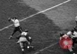 Immagine di Football americano New York City USA, 1940, secondo 15 filmato di repertorio 65675053252