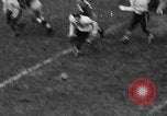 Immagine di Football americano New York City USA, 1940, secondo 16 filmato di repertorio 65675053252