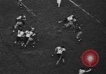 Immagine di Football americano New York City USA, 1940, secondo 37 filmato di repertorio 65675053252