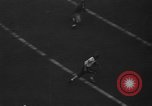 Immagine di Football americano New York City USA, 1940, secondo 41 filmato di repertorio 65675053252