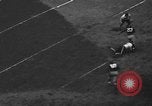 Immagine di Football americano New York City USA, 1940, secondo 55 filmato di repertorio 65675053252