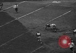 Immagine di Football americano New York City USA, 1940, secondo 56 filmato di repertorio 65675053252