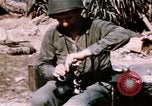 Image of War correspondent Pacific Theater, 1945, second 19 stock footage video 65675053287