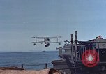 Image of Curtiss SOC-3 Seagull aircraft Kolombangara Solomon Islands, 1943, second 21 stock footage video 65675053311