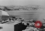 Standbild Zeitungsberichte Erfassung der britischen Seebasis Samos Griechenland, 1944, aus Sekunde 7 historischem Filmmaterial Videoclip 65675053352