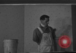 Image of One armed paperhanger United States USA, 1943, second 1 stock footage video 65675053440
