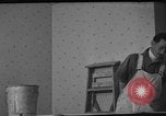 Image of One armed paperhanger United States USA, 1943, second 4 stock footage video 65675053440