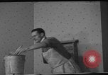 Image of One armed paperhanger United States USA, 1943, second 5 stock footage video 65675053440