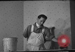 Image of One armed paperhanger United States USA, 1943, second 15 stock footage video 65675053440