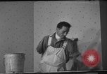 Image of One armed paperhanger United States USA, 1943, second 16 stock footage video 65675053440